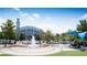 Community water fountain play area in front of the beautiful Suwanee City Hall building at 4231 Millcroft Pl # 207, Buford, GA 30518