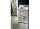 Bathroom vanity featuring white cabinets, black hardware, and modern sink at 6716 Browns Mill Rd, Lithonia, GA 30038