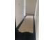 Hallway with dark wood floors and white walls at 6716 Browns Mill Rd, Lithonia, GA 30038