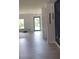 Bright, open-concept living area with hardwood floors and lots of natural light at 6716 Browns Mill Rd, Lithonia, GA 30038