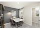 Chic dining area with stylish decor, modern furniture, and ample natural light at 1240 Arnhem Dr, Hampton, GA 30228