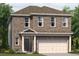 Two-story brick home with a two car garage and a covered front porch at 1240 Arnhem Dr, Hampton, GA 30228