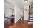 Home's foyer and entry featuring hardwood floors, staircase, and sightlines to other rooms at 2196 Kildare Nw Way, Kennesaw, GA 30152