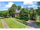 Beautifully landscaped front yard and inviting entrance to this classic two-story home at 2196 Kildare Nw Way, Kennesaw, GA 30152