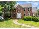 Attractive two-story brick home with a manicured lawn and classic design at 2196 Kildare Nw Way, Kennesaw, GA 30152