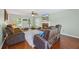Living room with hardwood floors, a fireplace with a TV, and two sofas at 2196 Kildare Nw Way, Kennesaw, GA 30152
