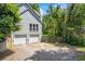Spacious home with a two car garage featuring an attached driveway with backyard access at 2196 Kildare Nw Way, Kennesaw, GA 30152