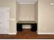 Dedicated built-in desk area with dark cabinets and granite countertop, ideal for a home office at 265 Edinburgh Ln, Woodstock, GA 30188