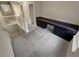 Loft area with custom built-in desk and drawers for plenty of storage with neutral paint and carpet at 265 Edinburgh Ln, Woodstock, GA 30188