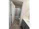 Bathroom featuring a shower and tub combination with modern sink and vanity at 3378 English Elm Way, Loganville, GA 30052