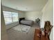 Neutral toned bedroom featuring carpeted floors, natural light and space for bedroom furnishings at 3378 English Elm Way, Loganville, GA 30052