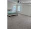 Large and inviting bedroom featuring two windows, a ceiling fan and neutral decor at 3378 English Elm Way, Loganville, GA 30052