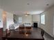 Spacious living room features a fireplace, ceiling fan, and hardwood floors at 3378 English Elm Way, Loganville, GA 30052