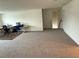 Bright open room offers flexible space and neutral tones, perfect for an office or play area at 3378 English Elm Way, Loganville, GA 30052