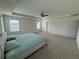 Large bedroom offering carpet floors and a ceiling fan with ample amounts of light at 3378 English Elm Way, Loganville, GA 30052