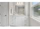 Bright bathroom with a vanity, great lighting, and a tile shower at 812 Dixie Ne Ave, Atlanta, GA 30307