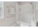 White subway tiled shower and bath at 812 Dixie Ne Ave, Atlanta, GA 30307