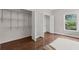 Spacious bedroom featuring hardwood floors and an open closet space at 812 Dixie Ne Ave, Atlanta, GA 30307