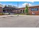 An outdoor shot capturing Krog Street Market, highlighting its brick architecture, signage, and inviting entrance at 812 Dixie Ne Ave, Atlanta, GA 30307