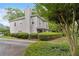 Exterior angle of townhome with mature landscaping and gray siding at 812 Dixie Ne Ave, Atlanta, GA 30307