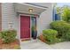 Charming front entrance with a vibrant red door and well-manicured landscaping at 812 Dixie Ne Ave, Atlanta, GA 30307