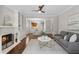 Inviting living room showcasing a fireplace, hardwood floors, and a comfortable seating area at 812 Dixie Ne Ave, Atlanta, GA 30307