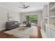 Cozy living room with hardwood floors, and a beautiful view of the backyard at 812 Dixie Ne Ave, Atlanta, GA 30307