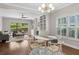 Spacious living area with lots of light with sliding glass doors to the exterior and access to the dining room at 812 Dixie Ne Ave, Atlanta, GA 30307
