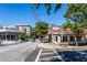A vibrant neighborhood street with commercial buildings, trees, and clear blue sky at 812 Dixie Ne Ave, Atlanta, GA 30307