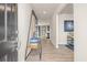 Inviting entryway with stylish decor, wood-look floors, decorative pillows and interior view at 1209 Arnhem Dr, Hampton, GA 30228