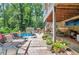 Large multi-level deck with outdoor seating and plants with pool views at 2165 Shillings Chase Nw Dr, Kennesaw, GA 30152