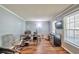 Functional home office space with natural light and room for multiple desks and setups at 2165 Shillings Chase Nw Dr, Kennesaw, GA 30152