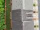 Aerial view of townhome rooftops, wooden fences, trimmed landscaping, and sidewalks at 262 Bell Grove Ln, Suwanee, GA 30024