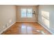 Bedroom with hardwood floors, neutral paint, and natural light from the window at 2693 Larkspur Se Dr, Atlanta, GA 30316