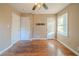 Bedroom with hardwood floors, ceiling fan and multiple closets at 2693 Larkspur Se Dr, Atlanta, GA 30316