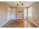 Bedroom with hardwood floors, neutral paint, ceiling fan, and natural light from the window at 2693 Larkspur Se Dr, Atlanta, GA 30316