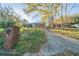 Ranch-style home featuring a brick mailbox and a long driveway with trees at 2693 Larkspur Se Dr, Atlanta, GA 30316