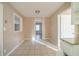 Eat-in kitchen with tiled floor and view of an adjoining room at 2693 Larkspur Se Dr, Atlanta, GA 30316