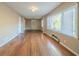 Spacious living room featuring hardwood floors and two windows at 2693 Larkspur Se Dr, Atlanta, GA 30316