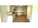 Well-lit kitchen boasts stainless appliances and plentiful cabinet space at 45 Emerald Ln, Covington, GA 30014