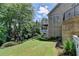 Spacious backyard featuring a lush lawn and upper and lower decks at 5357 Harbury Cv, Suwanee, GA 30024