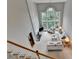 Bright living room with soaring ceilings and large windows offering great natural light and backyard views at 5357 Harbury Cv, Suwanee, GA 30024