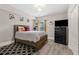 Comfortable bedroom with hardwood floors, natural light, and ample closet space at 10 Nesbit Reserve Ct, Atlanta, GA 30350
