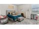 bedroom featuring plush carpet, a grey upholstered bed, and a white dresser with ample storage at 10 Nesbit Reserve Ct, Atlanta, GA 30350