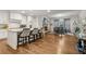 Open concept kitchen with granite countertops and bar stool seating at 10 Nesbit Reserve Ct, Atlanta, GA 30350