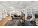Living room with hardwood floors, fireplace and an open layout at 10 Nesbit Reserve Ct, Atlanta, GA 30350