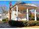 Beautiful two-story home with a brick chimney and impressive white columns at 1242 Star Ne Dr, Brookhaven, GA 30319