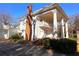 Classic two-story home featuring prominent columns and a brick chimney at 1242 Star Ne Dr, Brookhaven, GA 30319