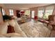 Bright living room with large area rug and a neutral colored sofa at 1242 Star Ne Dr, Brookhaven, GA 30319