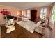 Spacious living room connected to the dining area; has lots of seating and hardwood floors at 1242 Star Ne Dr, Brookhaven, GA 30319